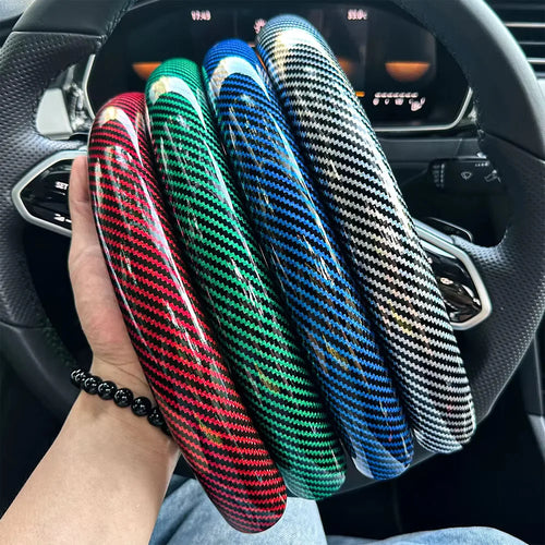 Carbon fiber silicone steering wheel cover 3 piece set.