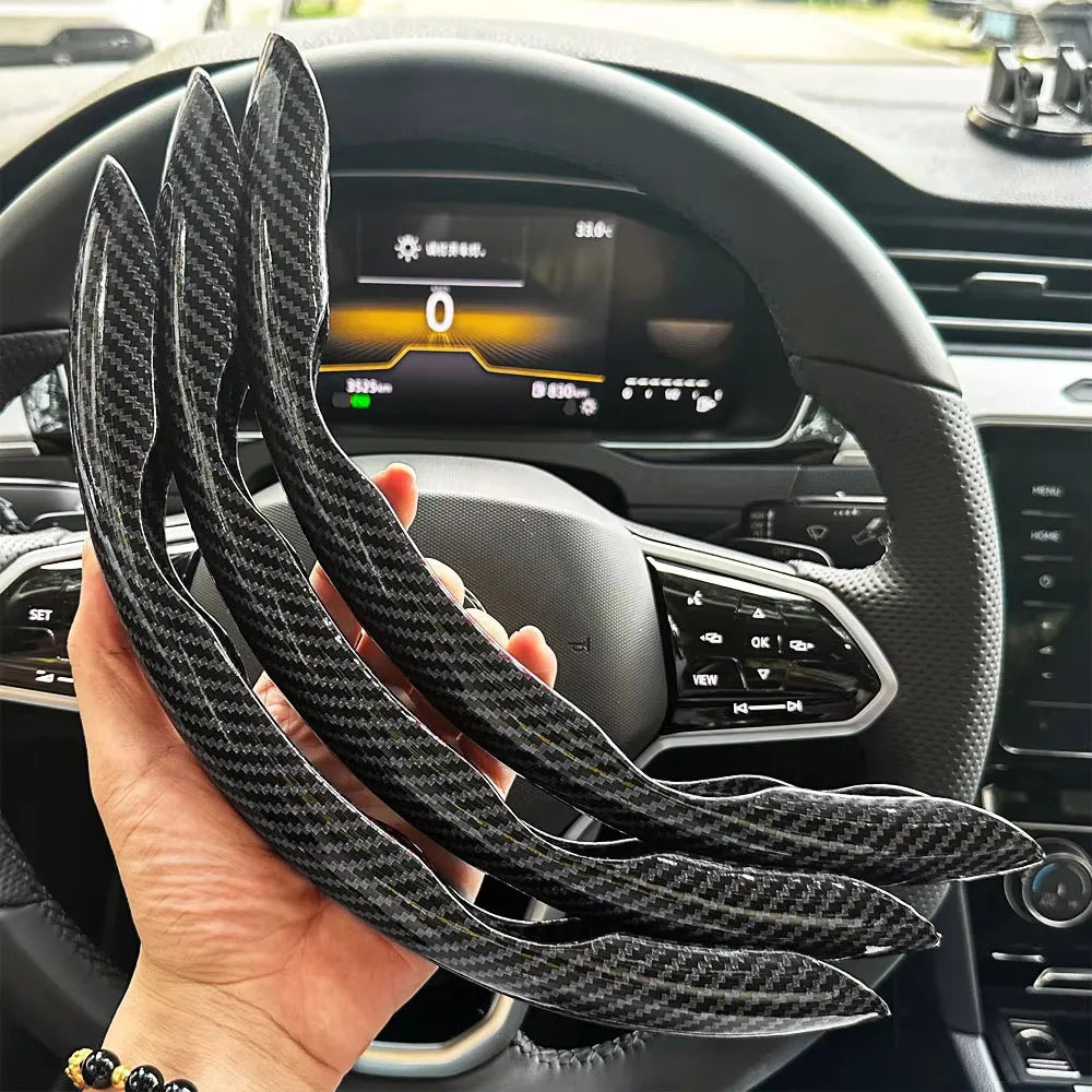 Carbon fiber silicone steering wheel cover 3 piece set.